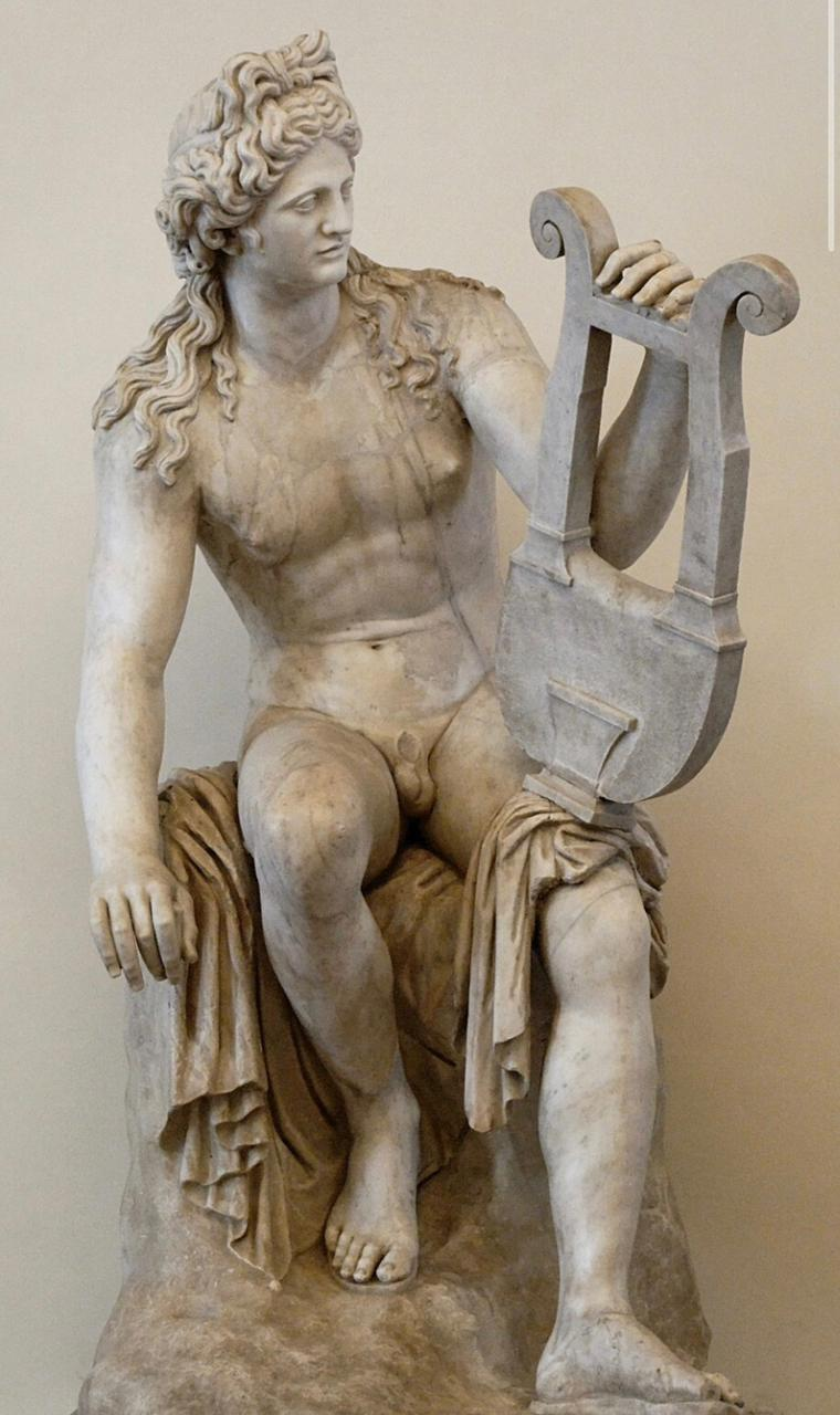 Marble statue of Apollo holding a lyre